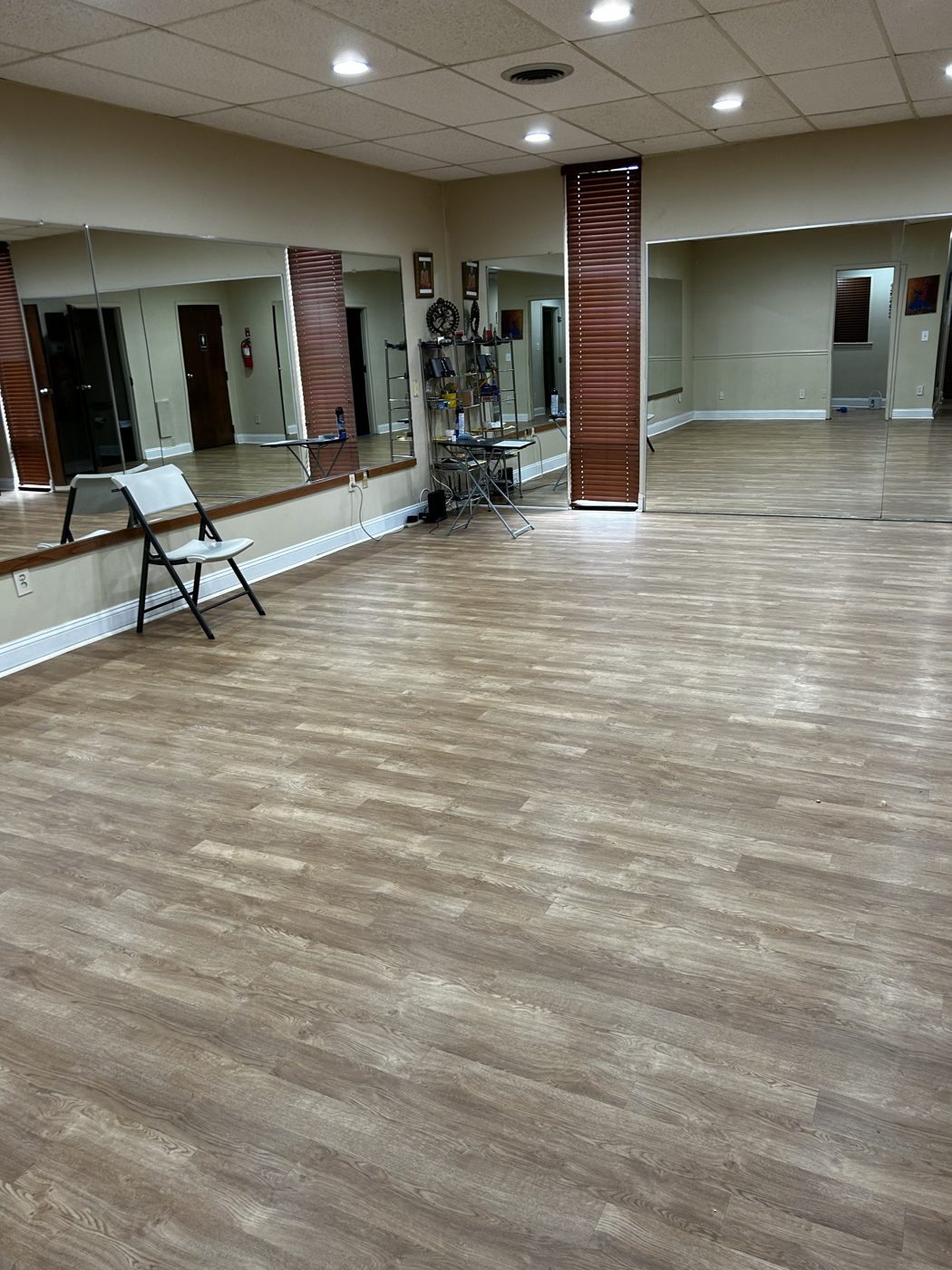 Luxury vinyl plank across a large open studio space
