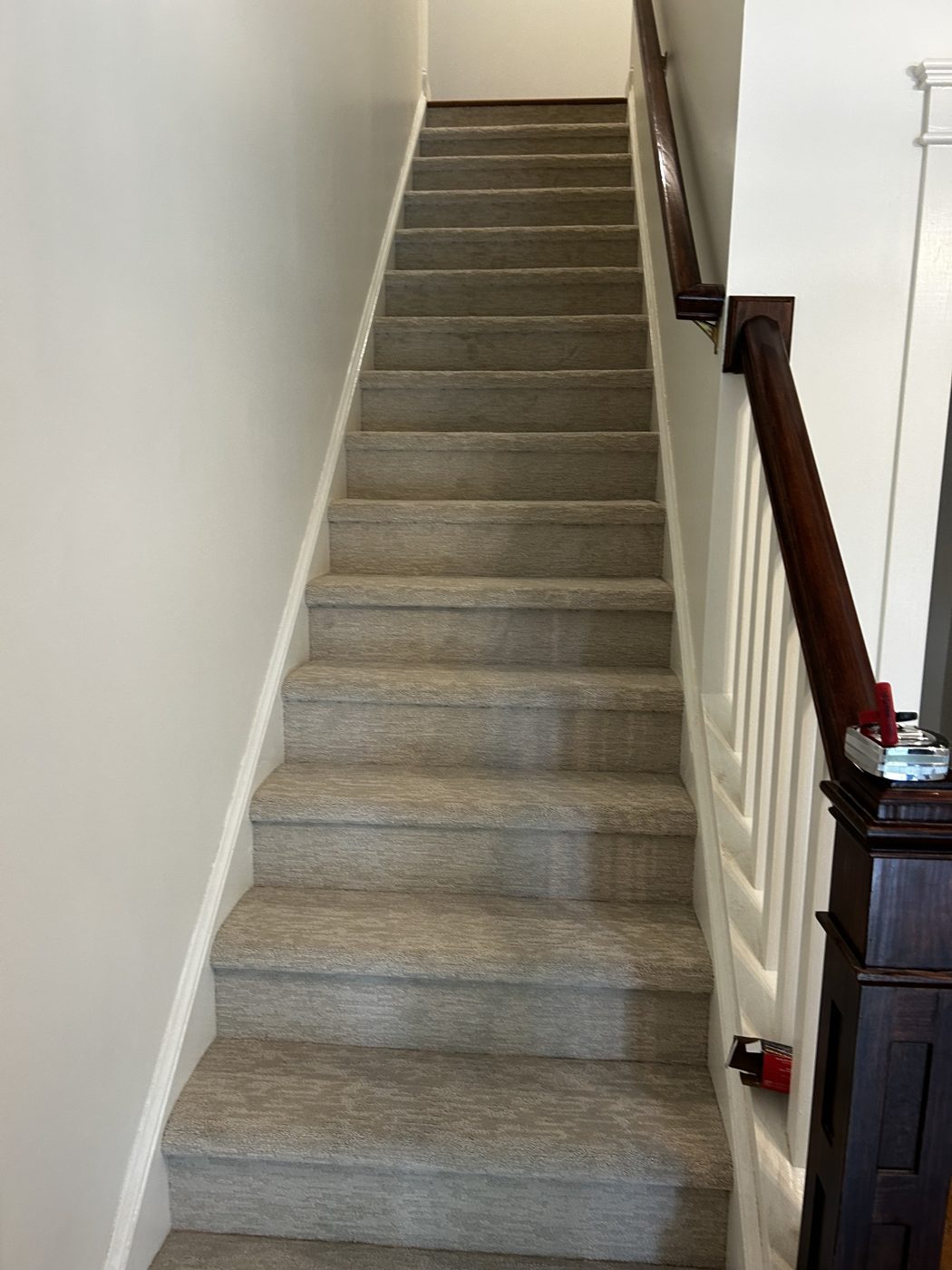 Neutral carpet installed on a full staircase